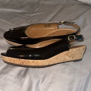 NWOT women’s Clarks Black patent leather wedge,slingback w gold buckle, sz 11W
